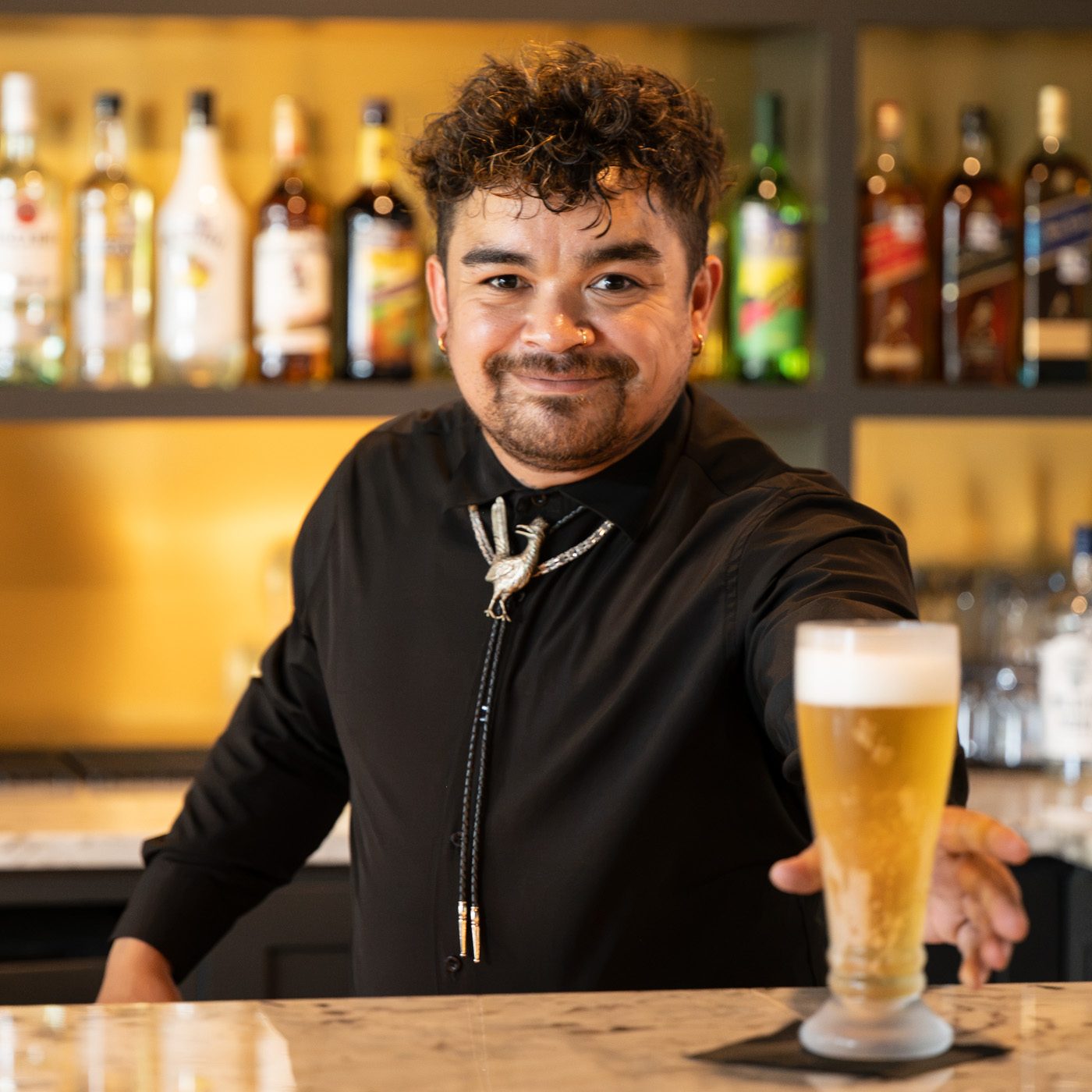 The Last Shot bartender pouring a cold one